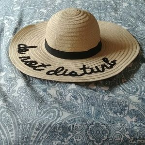 Floppy straw hat with message